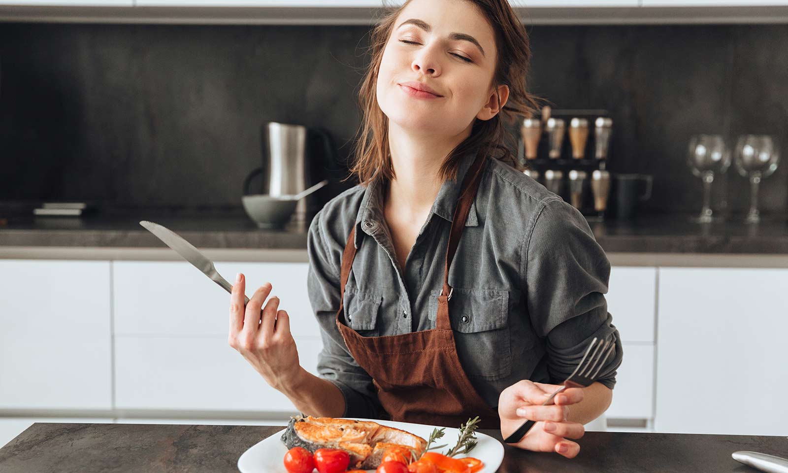 She is in the kitchen